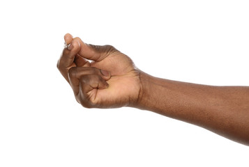 African-American man holding something in hand on white background, closeup