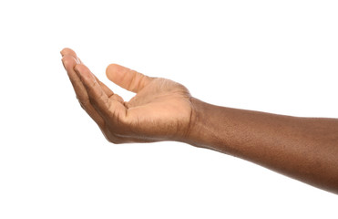 African-American man holding something in hand on white background, closeup