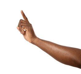 African-American man pointing at something on white background, closeup