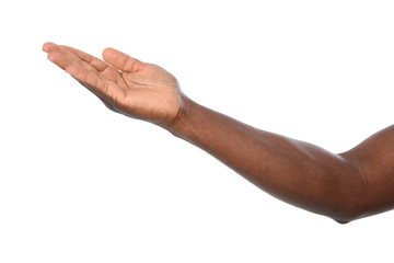 African-American man holding something in hand on white background, closeup