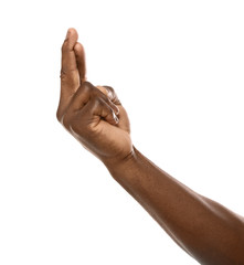 African-American man crossing fingers on white background, closeup