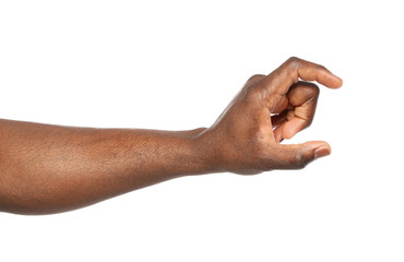 African-American man holding something in hand on white background, closeup
