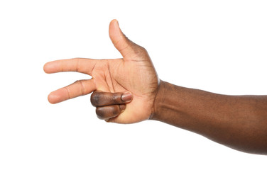 African-American man showing number TWO on white background, closeup