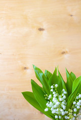 flowers lily of the valley spring wooden background