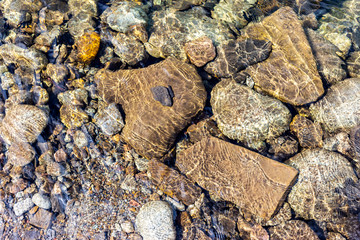 stone in the water background