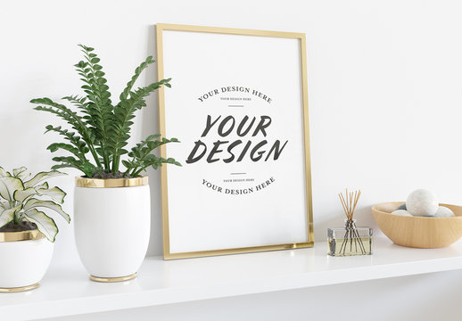 Vertical Frame Leaning on Shelf with Plants and Books Mockup
