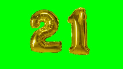 Number 21 twenty one years birthday anniversary golden balloon floating on green screen