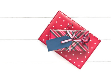 Fototapeta na wymiar Christmas greeting card with gift boxes