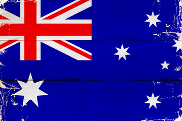 Flaga Australii malowana na starej desce.