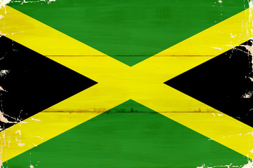 Flaga Jamajki malowana na starej desce.