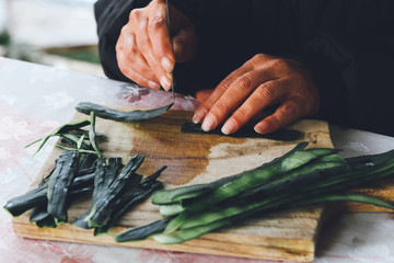 Woman's hands making food decoration