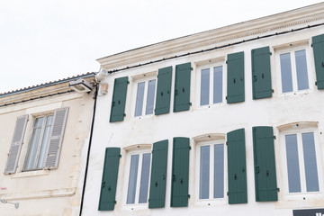 France Isle of Re old stone house with green shutters