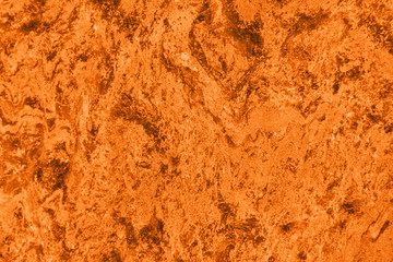 Close up of abstract turmeric orange toned granite stone texture with high resolution. For background, textures, product designs, albums, cards and invitations, catalogs