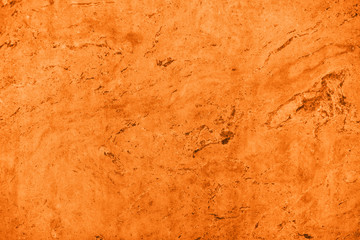 Close up of abstract turmeric orange toned granite stone texture with high resolution. For background, textures, product designs, albums, cards and invitations, catalogs