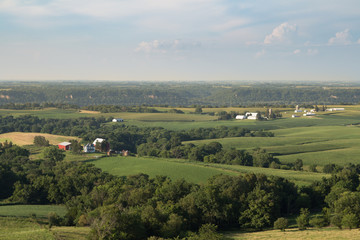 Rolling hills of Southwest Wisconsin countryside on a hazy summer July day