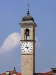 bell tower of the sanctuary with clock and sundial. saronno - Italy