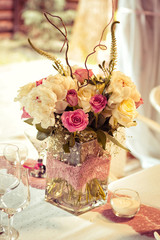  Wedding decorations. Rings on textiles, decorations with fresh flowers, candles, catering in purple tone. Stylish holiday atmosphere