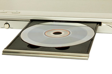 DVD player with inserted disc taken closeup.
