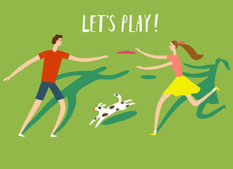 Man and woman at the park playing freesbie.