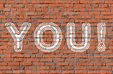 You! Inscription on the seamless brickwall.