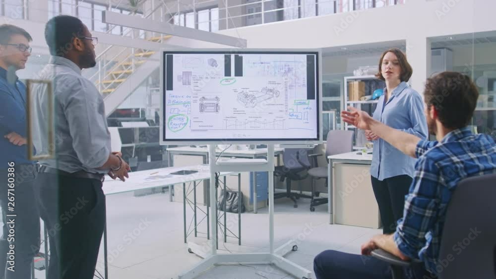 Poster in the in industrial design facility team of engineers and technicians have a meeting, female specia