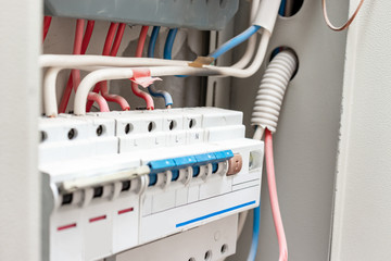 Automatic switches and wires in electrical shield close up