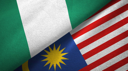 Nigeria and Malaysia two flags textile cloth, fabric texture
