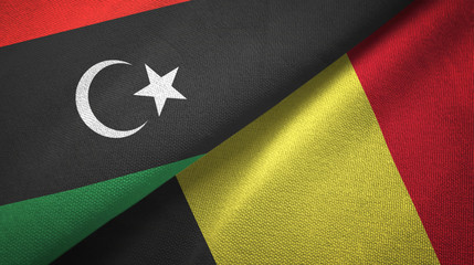 Libya and Belgium two flags textile cloth, fabric texture 