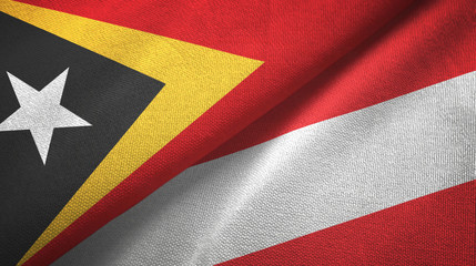 East Timor and Austria two flags textile cloth, fabric texture 