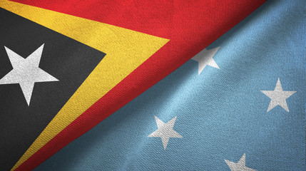 East Timor and Micronesia two flags textile cloth, fabric texture