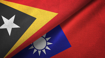 Fototapeta premium East Timor and Taiwan two flags textile cloth, fabric texture