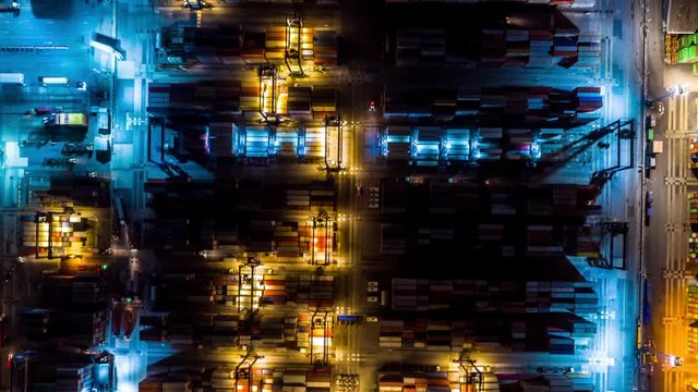4k Hyperlapse aerial view container ship loading and unloading in deep sea port, Aerial top view of logistic import export transportation business by container ship in open sea.