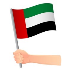 united arab emirates flag in hand