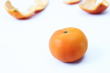 Fresh orange and orange peeles skin as background