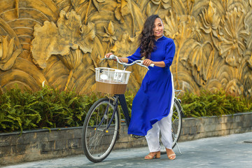 Young asian woman in traditional vietnamese dress ao dai