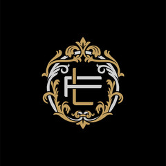 Initial letter F and L, FL, LF, decorative ornament emblem badge, overlapping monogram logo, elegant luxury silver gold color on black background