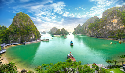 Beautiful landscape Halong Bay view from adove the Bo Hon Island. Halong Bay is the UNESCO World Heritage Site, it is a beautiful natural wonder in northern Vietnam - obrazy, fototapety, plakaty