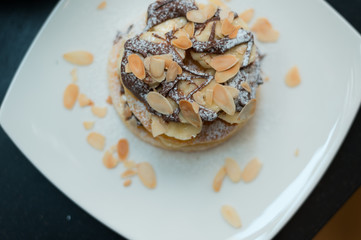 two waffles and banana with chocolate sauce 