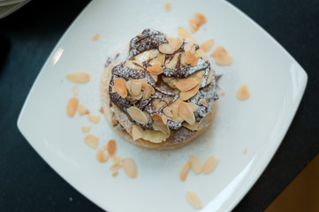 two waffles and banana with chocolate sauce 