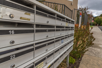 modern metallic mail box in share common area space of condominium apartment flat unit