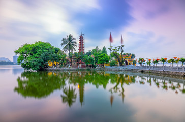 Tran Quoc pagoda at sunset on the West Lake peninsula oldest temple in Hanoi, Vietnam