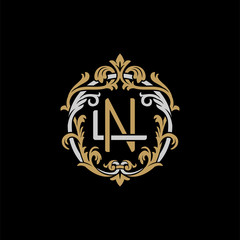 Initial letter L and N, LN, NL, decorative ornament emblem badge, overlapping monogram logo, elegant luxury silver gold color on black background