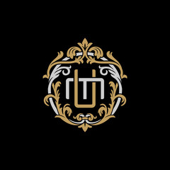 Initial letter M and U, MU, UM, decorative ornament emblem badge, overlapping monogram logo, elegant luxury silver gold color on black background