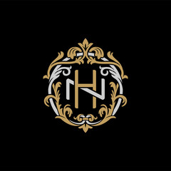 Initial letter N and H, NH, HN, decorative ornament emblem badge, overlapping monogram logo, elegant luxury silver gold color on black background