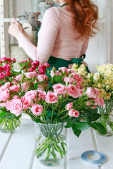Florist working with roses.