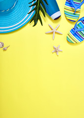 Flat lay yellow summer travel concept background