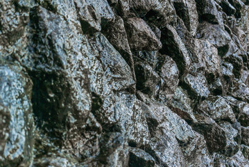 Large, rough stones that resemble the part of the rock through which water flows