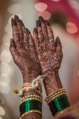 Brides hand with Mehendi design