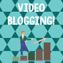 Word writing text Video Blogging. Business photo showcasing form of blog for which the medium is video Web television Smiling Businessman Climbing Colorful Bar Chart Following an Arrow Going Up
