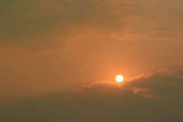 Sunrise in summer time with the clouds and orange sky. Nature background concept.